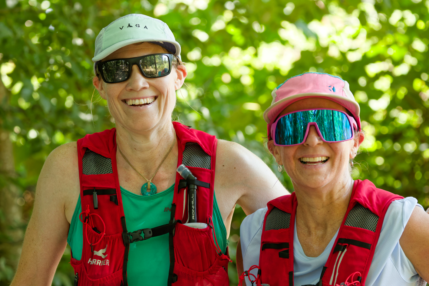 Two runners at the 2026 Beat the Ferry — all smiles on the trail
